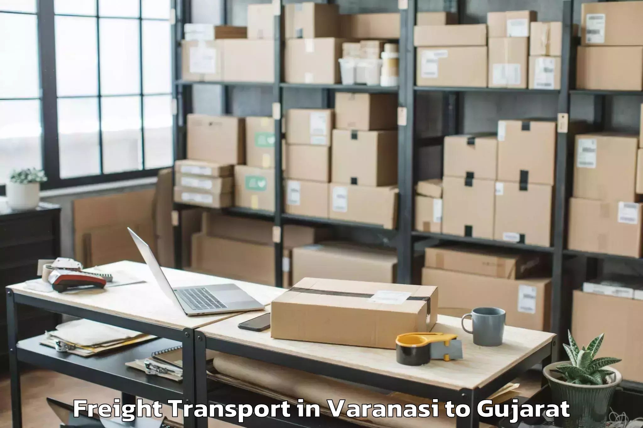 Get Varanasi to Vansada Freight Transport